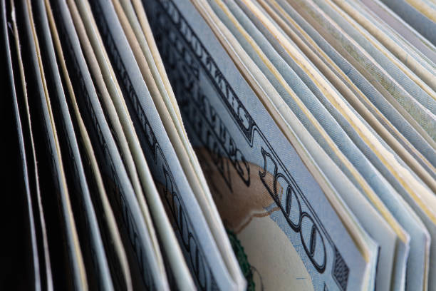istock closeup of dollar banknotes on edge 1397071347