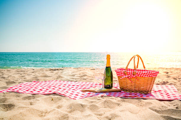 istock Picnic basket and Champagne by the beach 1397072464