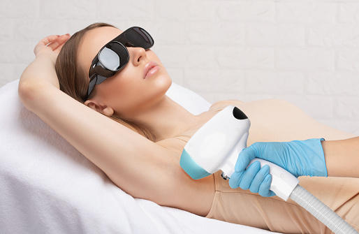 Elos epilation hair removal procedure on a woman