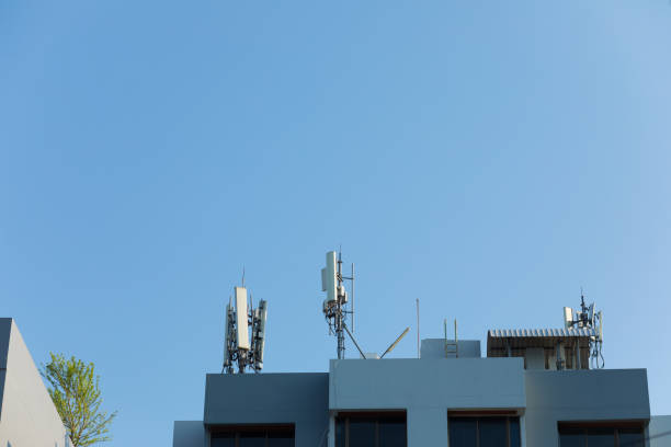 istock Several 4g antennas at corners of rooftop 1397073969