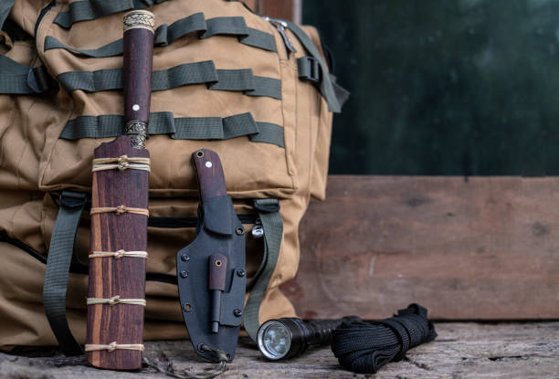istock A knife with equipment for survival in the forest 1397074014