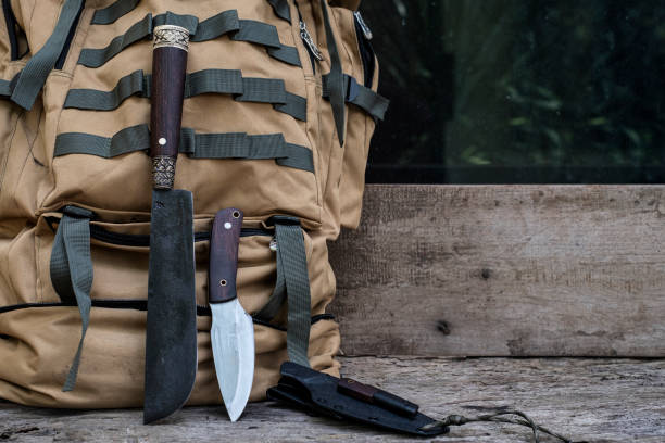 istock A knife with equipment for survival in the forest 1397074017