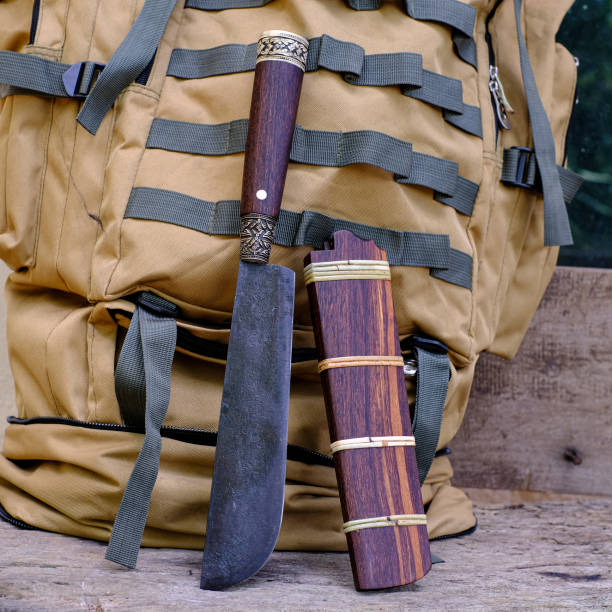 istock Knife with a backpack for survival in the forest 1397074028