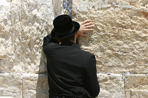 istock pray at the western wall jerusalem 139707506
