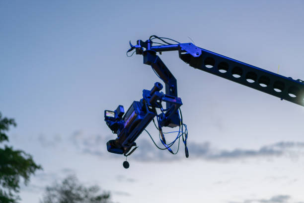 istock TV Broadcast Camera on a mobile crane against a blue sky 1397079269