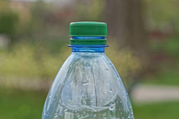 istock part of one plastic wet bottle closed with a green cork 1397081098