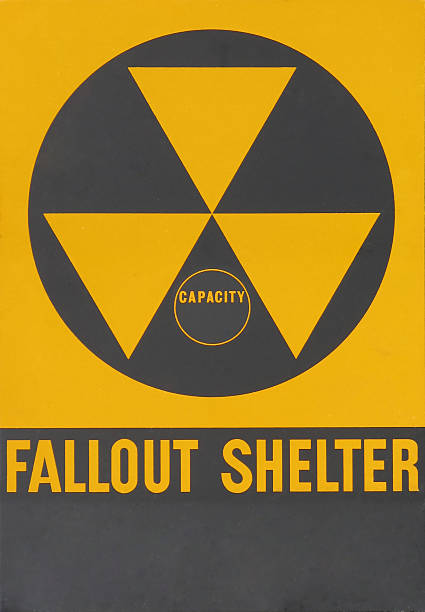 Fallout Shelter Warning Sign Vintage "Fallout Shelter" warning sign nuclear fallout stock pictures, royalty-free photos & images
