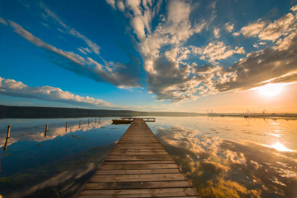 istock Small Dock and Boat at the lake 1397082040