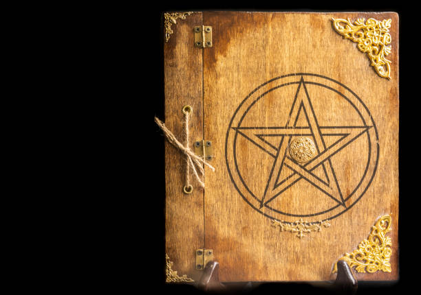 istock Old book of black magic. Concept for mystery, fantasy, evil 1397083036