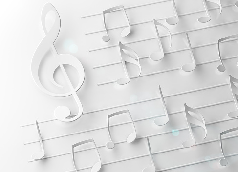 Abstract concept of symphony and classical music.Bass clef and music sheet in white color.