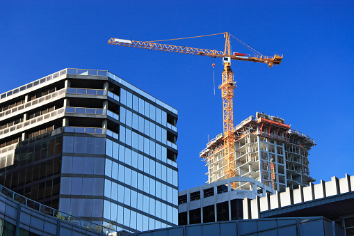 Crane on the residential building constructions site