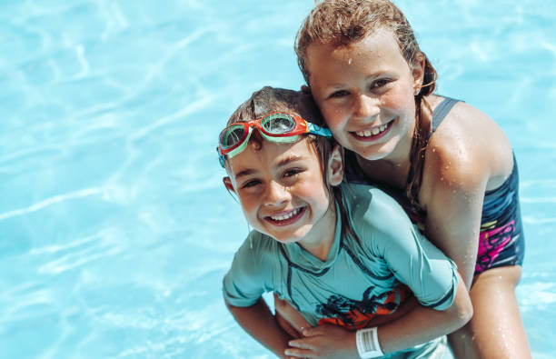 istock Happy Kids in the Pool 1397088010