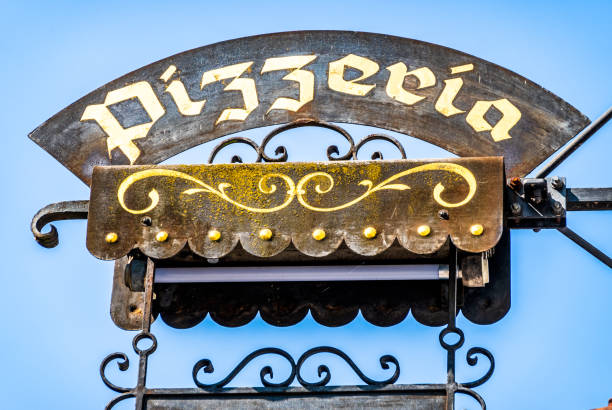 istock typical pizzeria sign in front of blue sky 1397088614