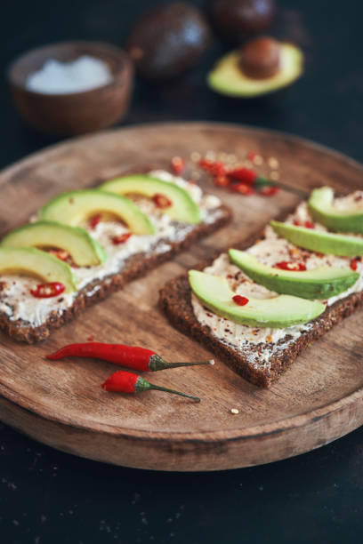 istock Avocado Sandwich with Brown Bread, Cottage Cheese and Chili 1397090076