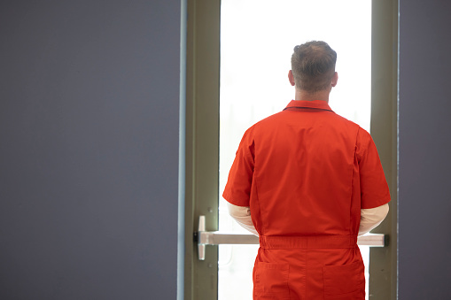 A prisoner receiving healthcare in prison/jail.