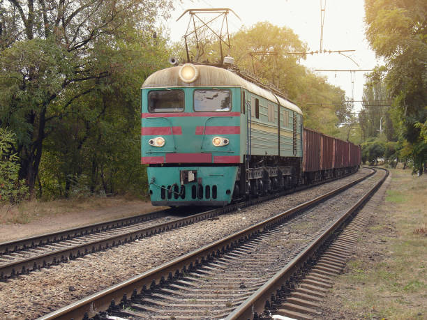 istock Freight train approaches to the station. Mariupol. 1397091075