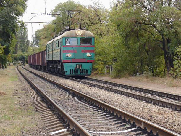 istock Freight train approaches to the station. Mariupol. 1397091105