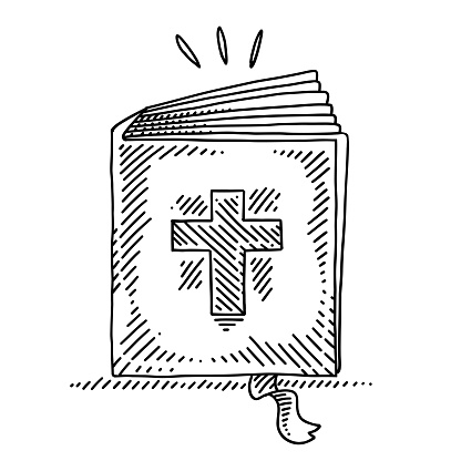 Bible with the symbol of the cross on the front