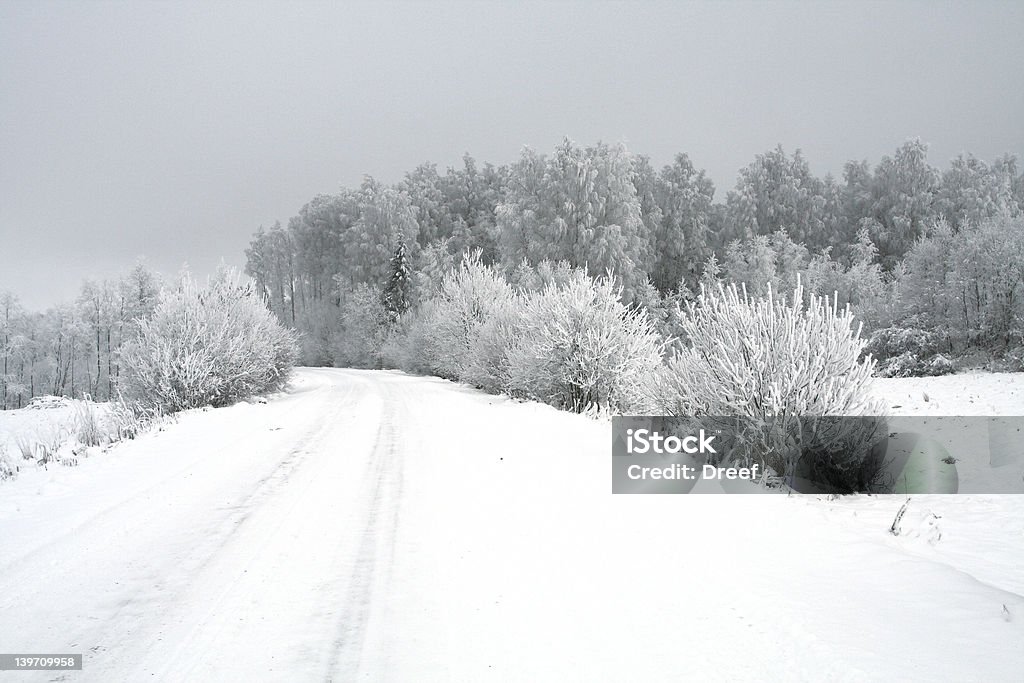 Winterroad Snowy winterroad landscape. Backgrounds Stock Photo