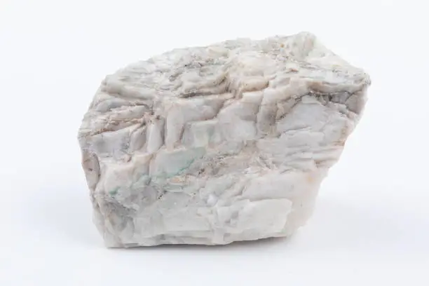 Photo of Barite or Barytes is a naturally occuring mineral made of Barium Sulphate and the source of the element Barium. It is white or colourless and crystaline with a distinct heavy density.