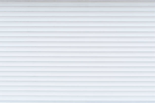 istock White anti-theft shutters closeup 1397103747