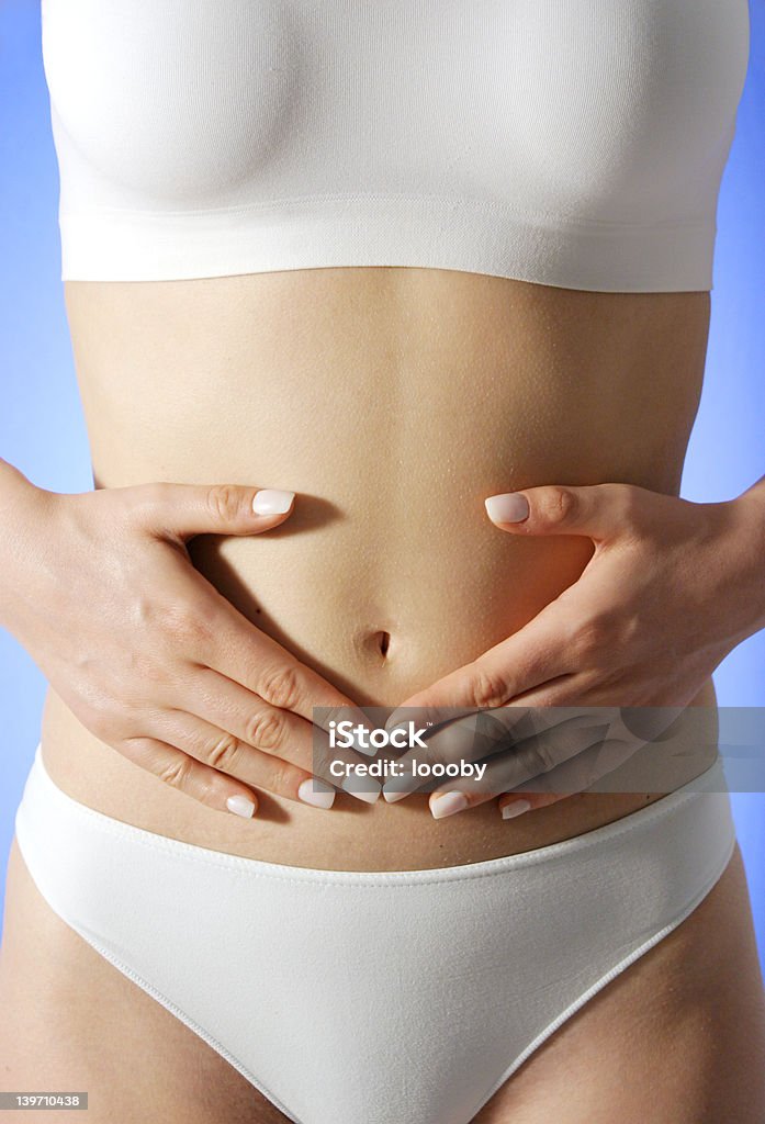 Estómago - Foto de stock de Abdomen libre de derechos