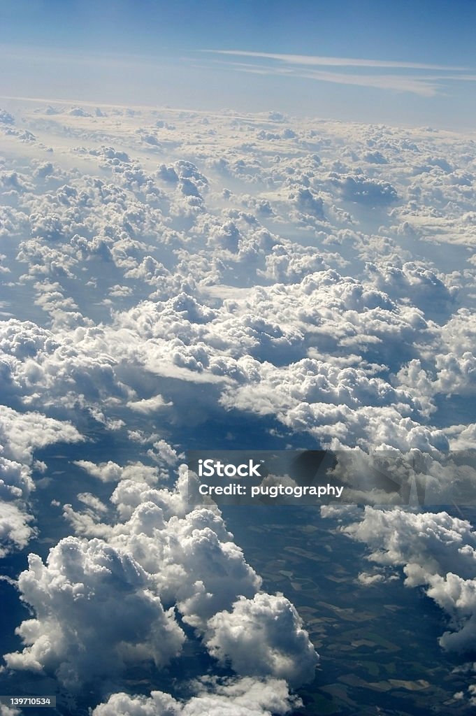 View From Above, Clouds Flying over a cloudy afternoon sky. Airplane Stock Photo