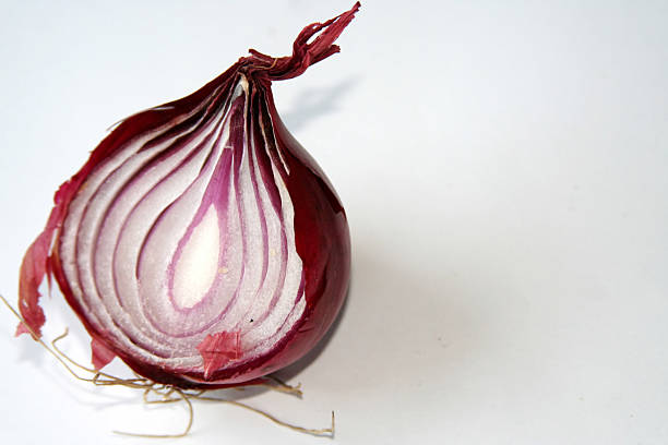 red onion half red onion cut in half, space for copy onion layer stock pictures, royalty-free photos & images