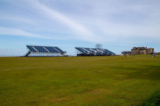 St. Andrews, Scotland, United Kingdom - April 28, 2022: View of the 18th fairway at the Royal and Ancient Gold Club of St Andrews Old Course, with guests. St Andrews is the oldest golf course in existence.