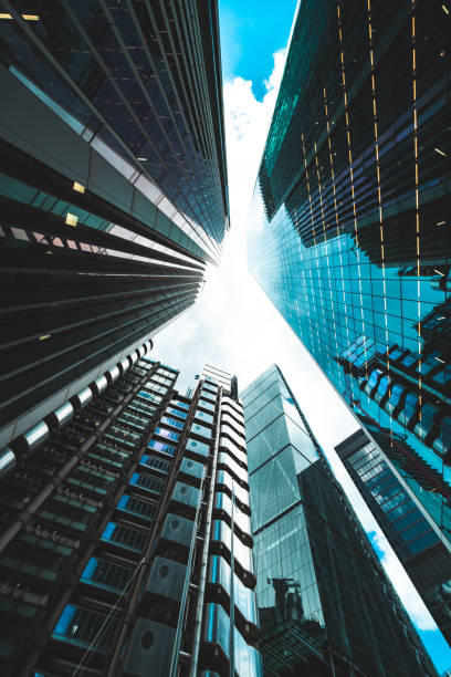 Looking directly up at the skyline of the financial district in central London Looking directly up at the skyline of the financial district in central London central london skyline stock pictures, royalty-free photos & images