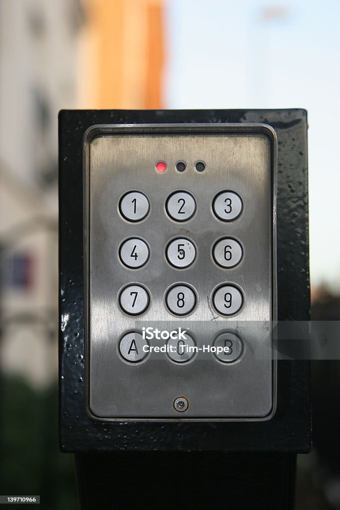 Keypad system Keypad security entry system. Shallow depth of field used to isolate keypad entry system Building Entrance Stock Photo