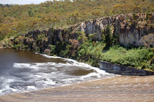 The spillway at the South Para Reservoir and the nearby cliffs.