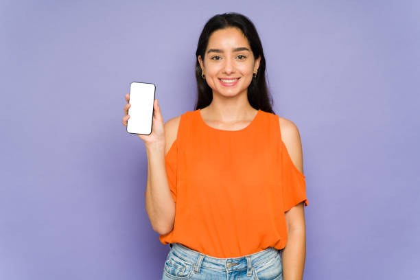 istock Beautiful woman using a smartphone 1397112454