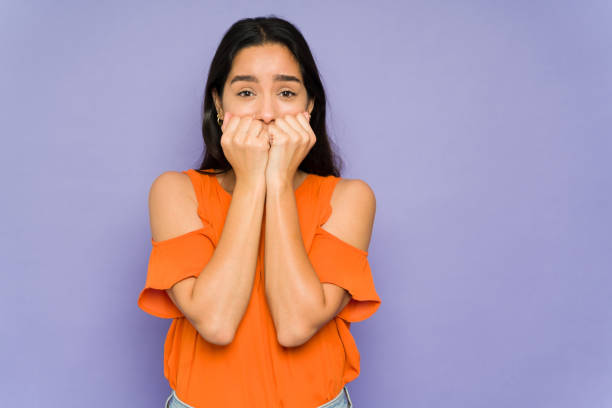 istock Stressed woman watching something scary 1397112480