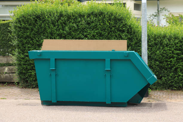Loaded garbage dumpster stock photo