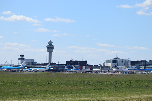 Amsterdam Airport Schiphol, The Netherlands -  May 5th 2020: Airport in lockdown. Limited air traffic because of the Corona Covid 19 virus