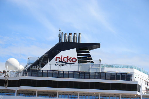 IJmuiden, The Netherlands - July 8th 2021: Vasco da Gama Mystic cruises at IJmuiden terminal. Detail of funnel and logo