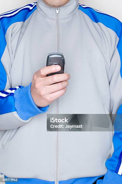 Inviare Sms - Fotografie stock e altre immagini di Tuta da ginnastica - Tuta da ginnastica, Stile retrò, Abbigliamento casual