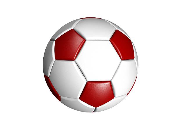 Young soccer player's jumping and kicking.