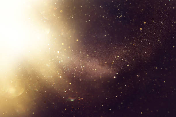 istock background of abstract glitter lights. gold and black. de focused 1397121449