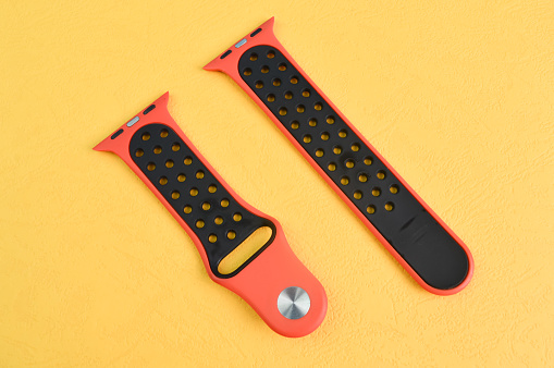 Klang, Malaysia: September 6, 2021- Apple Watch straps isolated on e yellow background