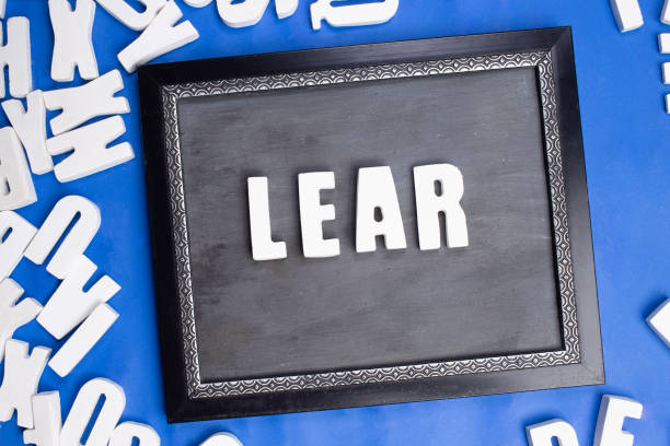 Black sign with word lear formed with single white letters