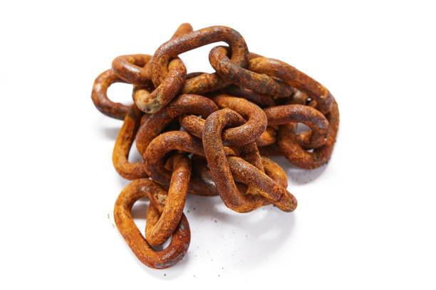 Old rusted and weathered chain isolated on white background.