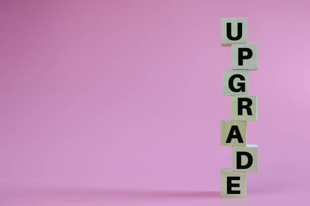 istock Stack of wooden blocks with text UPGRADE 1397133500