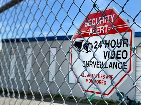 Photos Security alert 24 hours sign video surveillance all activities monitor monitoring monitored camera services wholesale storehouse storage safety protocols code anti theft  closed terminal territory