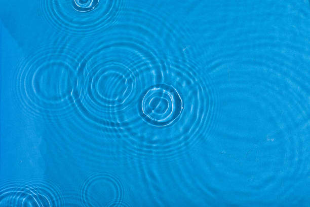 istock Blue Water ripples background -  underwater texture. Sun shining through water. 1397141618