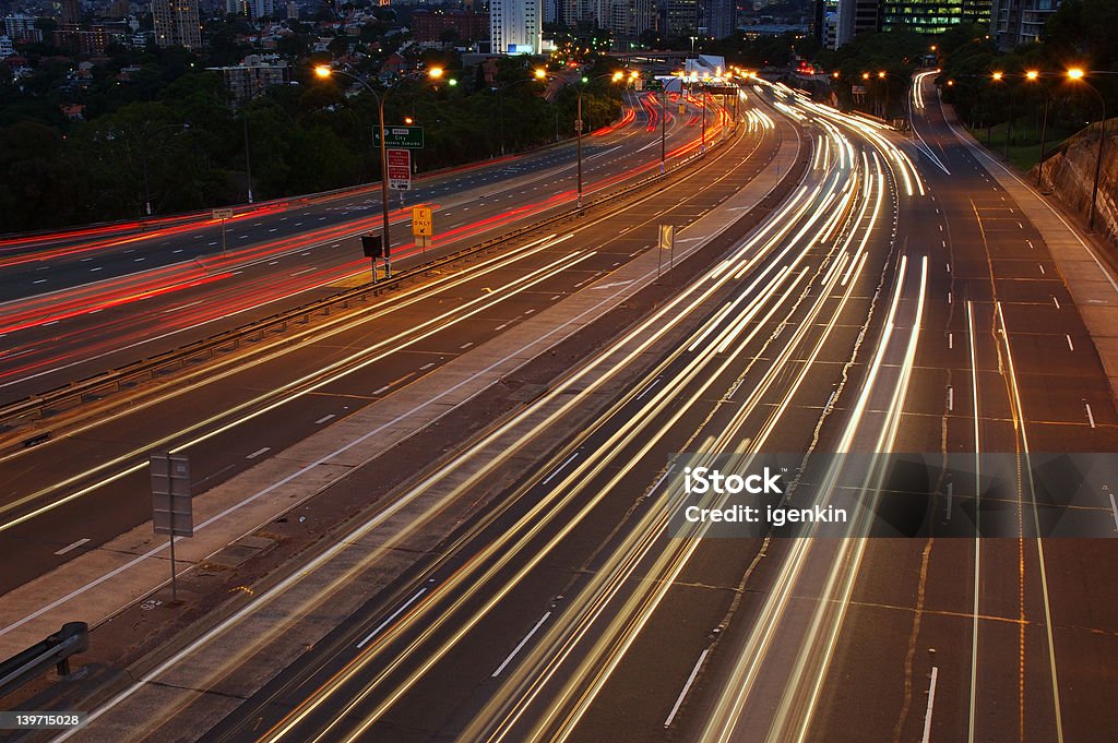 After Dark Cars traveling on a motorway at night. Activity Stock Photo