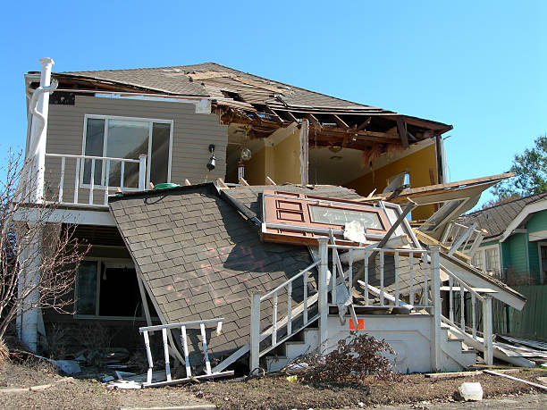 Katrina Comes Knocking this is what happens to your front door when Katrina knocks on it collapsing stock pictures, royalty-free photos & images