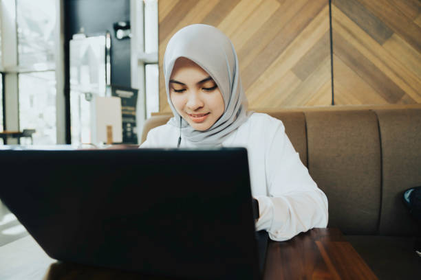 istock asian muslim woman working in the cafe 1397152152