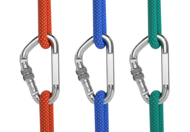 Photo of Steel carabiner hook with a red, blue and green climbing rope isolated on white. 3d rendering